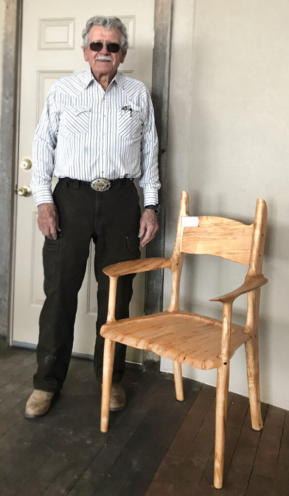 Roy Taylor with a chair he designed