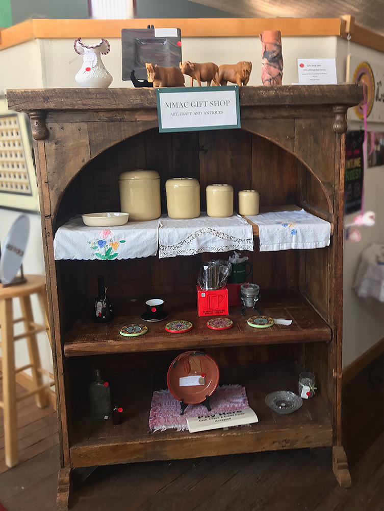 Gift shop_display case with candles_and_ various knick-knacks